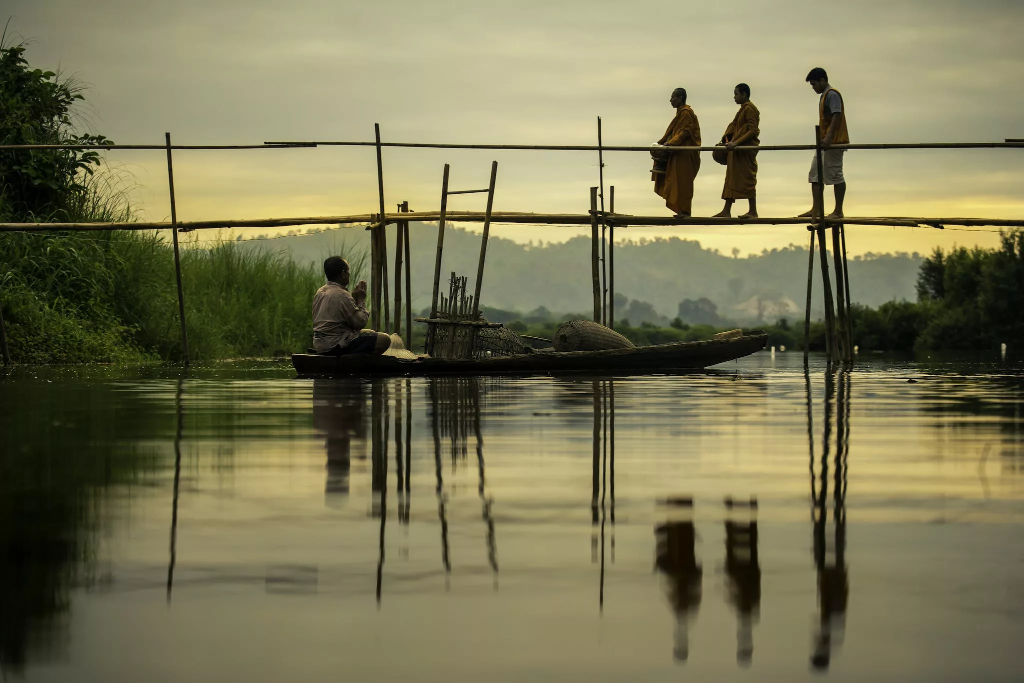 Shallow Focus Photo of People Crossing A Bridge