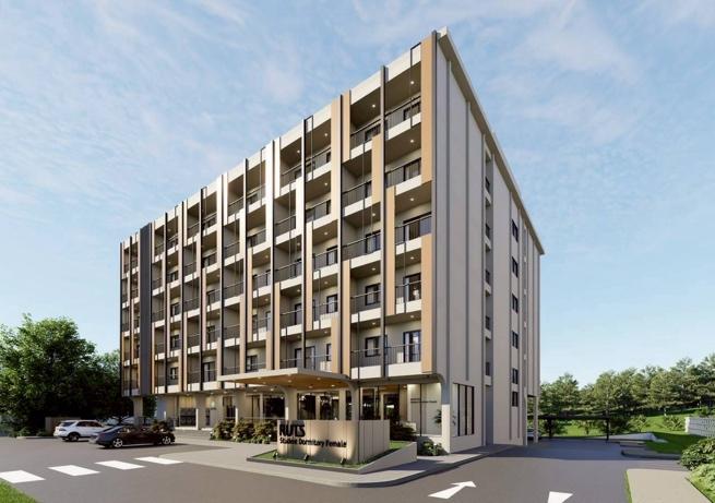 A building with many windows
AI-generated content may be incorrect.