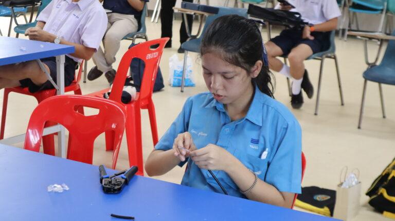 A child sitting at a table

AI-generated content may be incorrect.