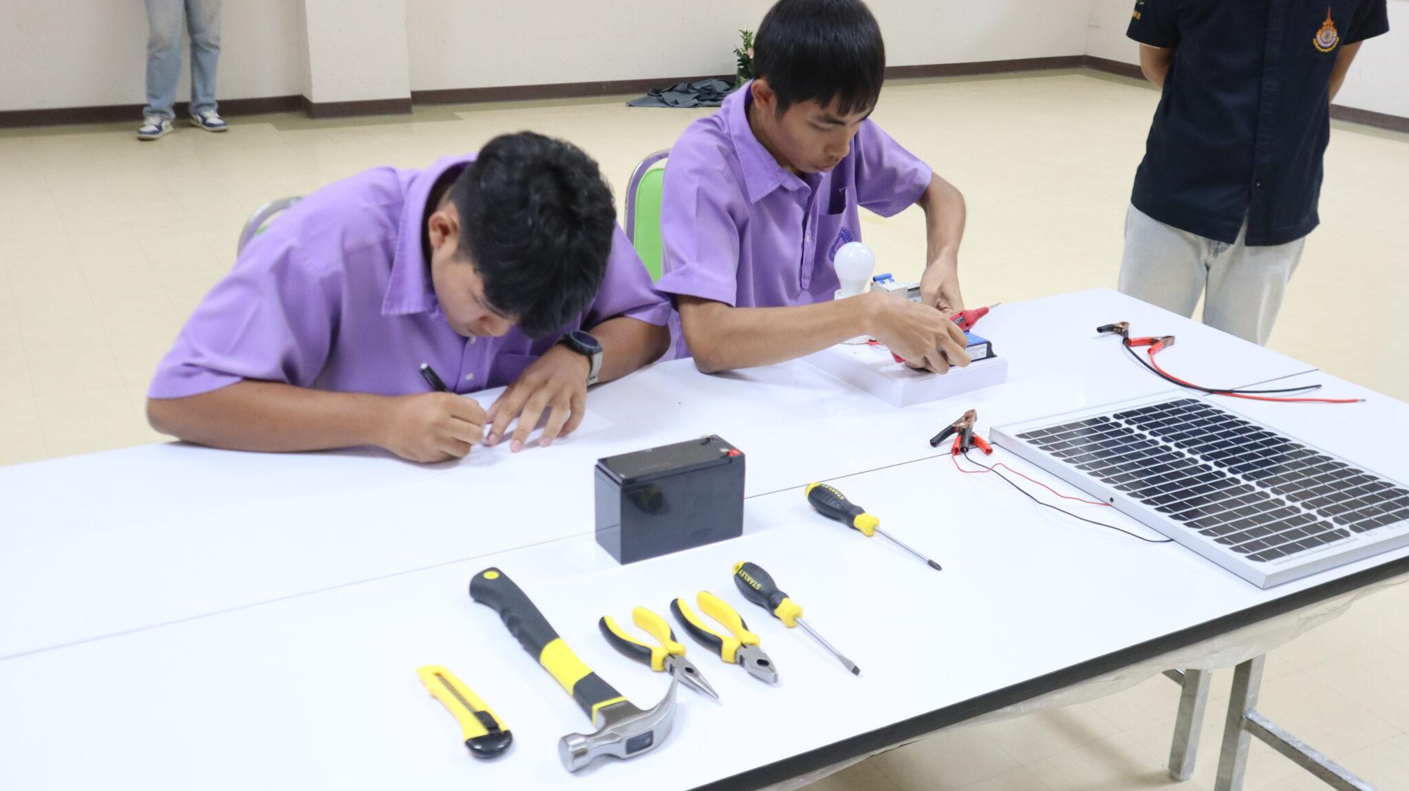 A couple of young men working on a project

AI-generated content may be incorrect.