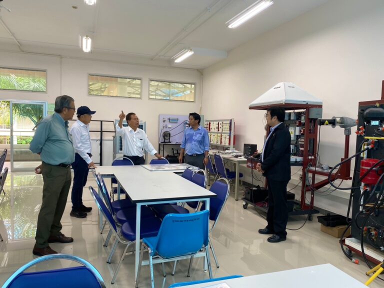 A group of people in a room AI-generated content may be incorrect.