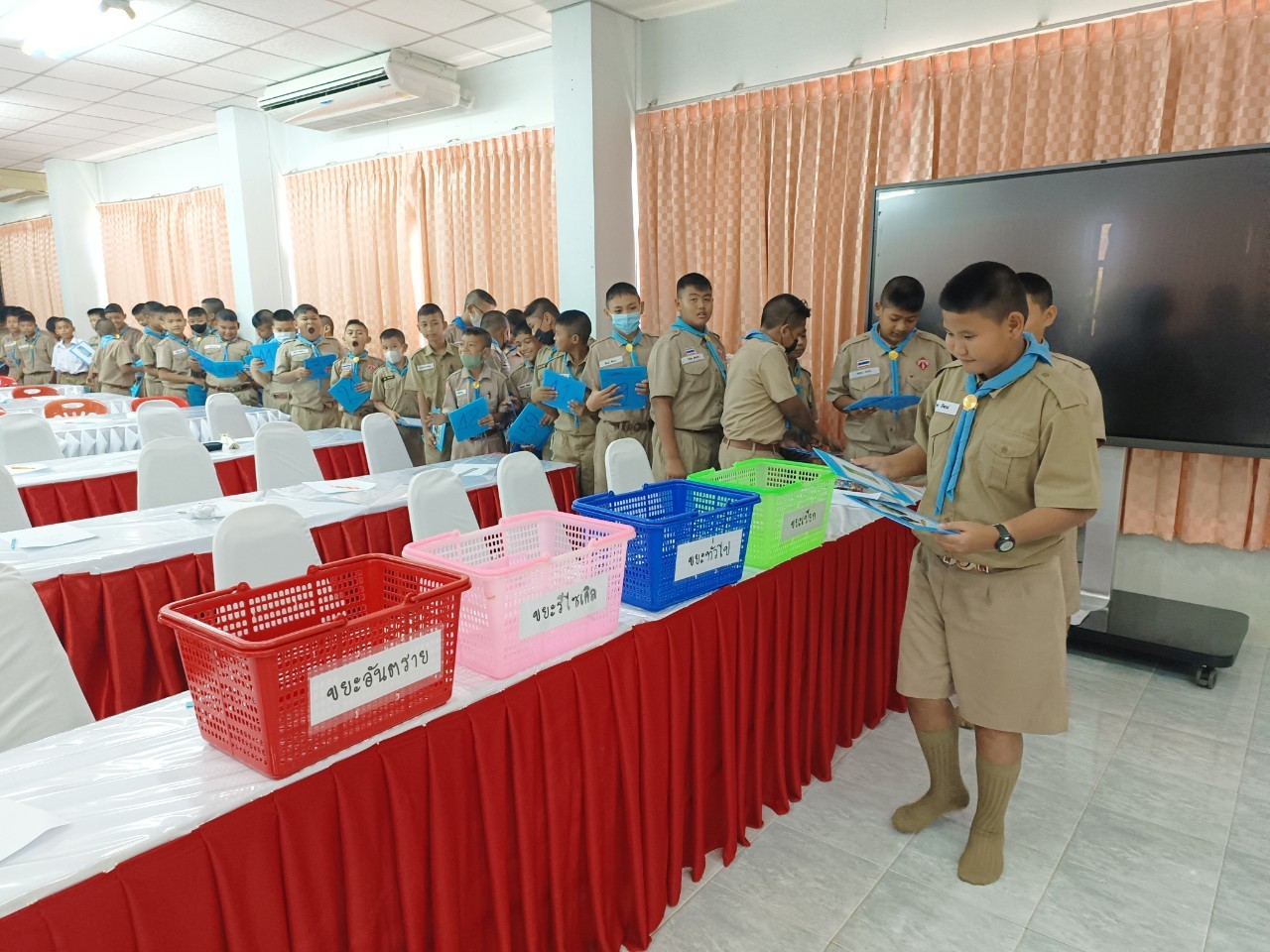 A group of people in uniform standing in front of a table

AI-generated content may be incorrect.