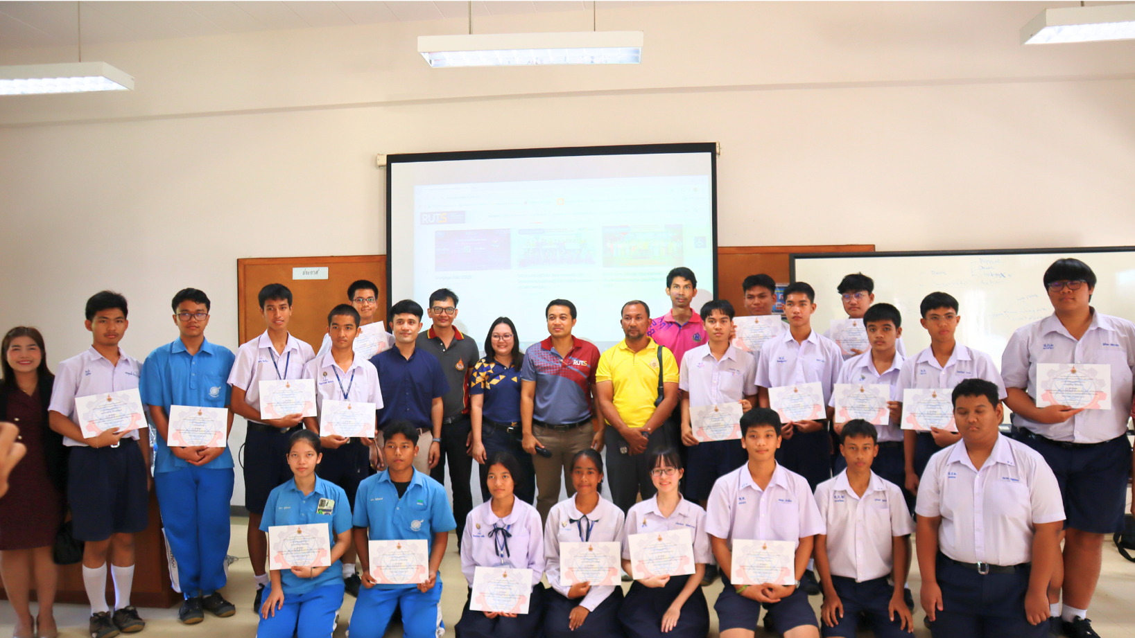 A group of people posing for a photo

AI-generated content may be incorrect.