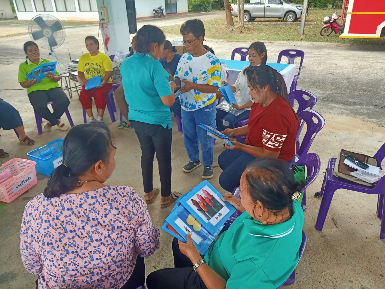 A group of people sitting in a circle

AI-generated content may be incorrect.