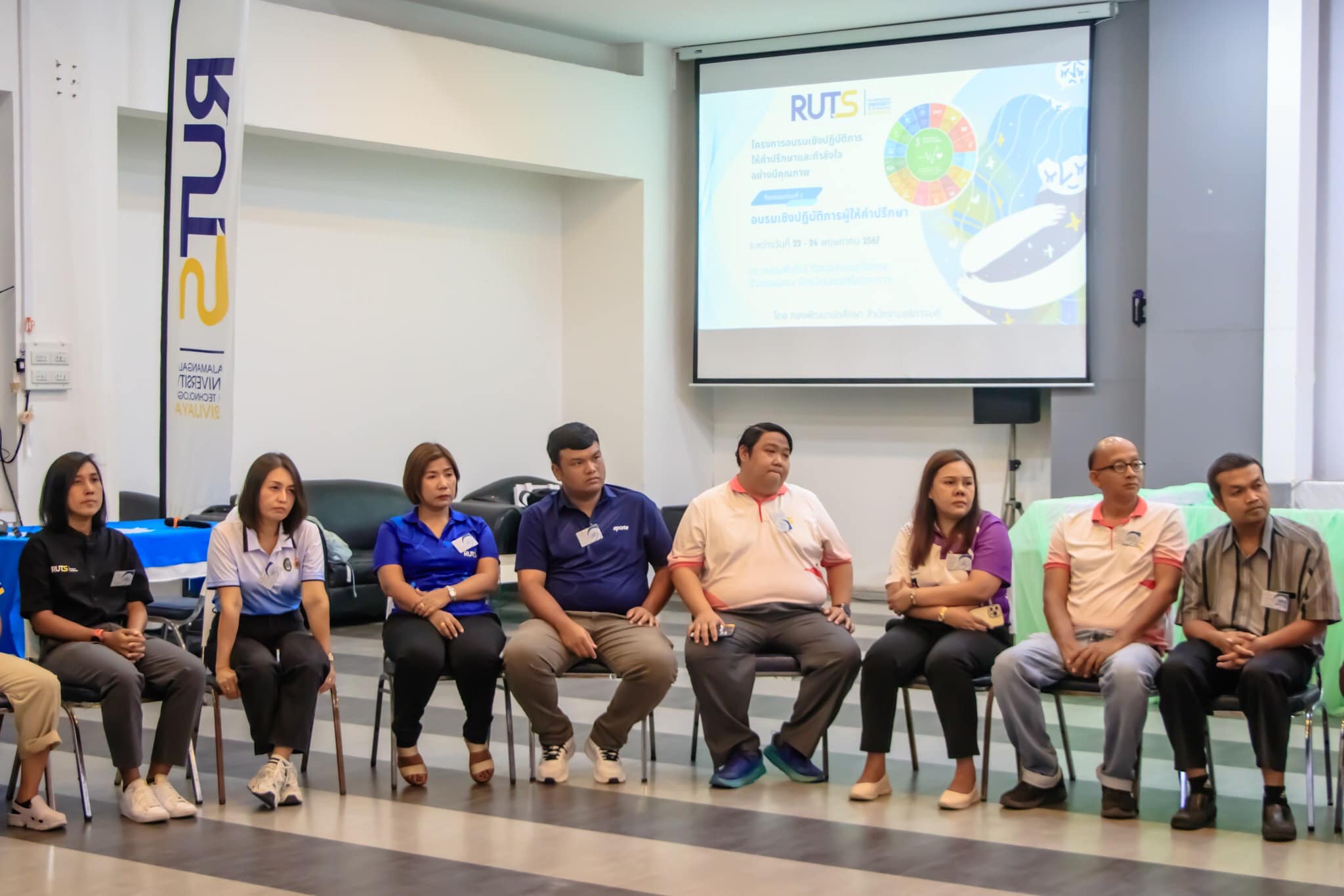 A group of people sitting in chairs
AI-generated content may be incorrect.