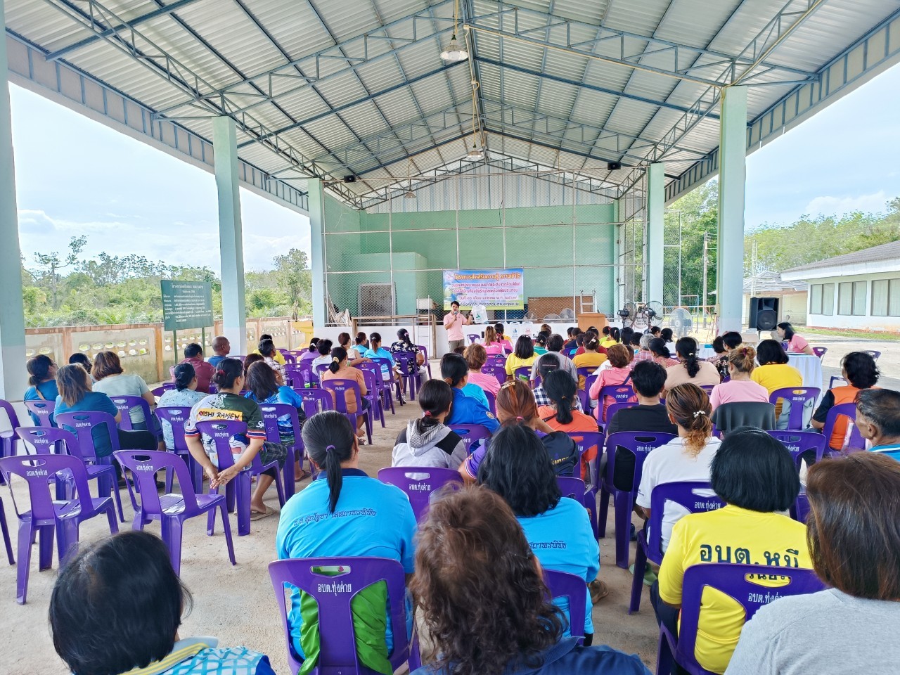 A group of people sitting in chairs AI-generated content may be incorrect.