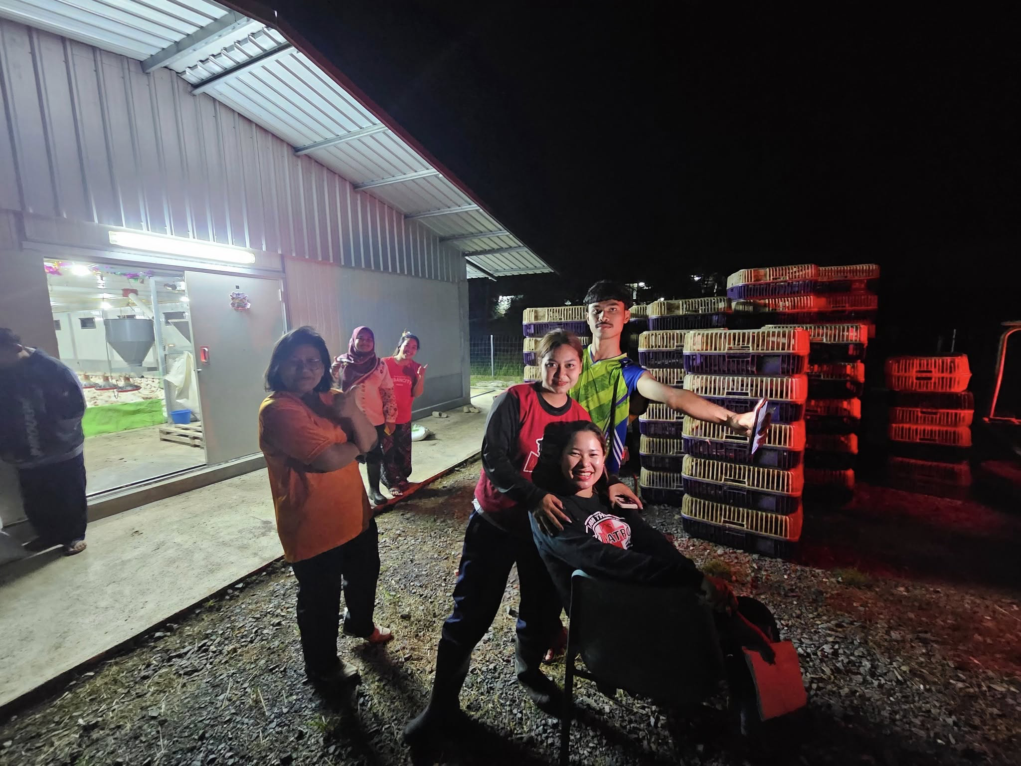 A group of people standing outside a building
AI-generated content may be incorrect.