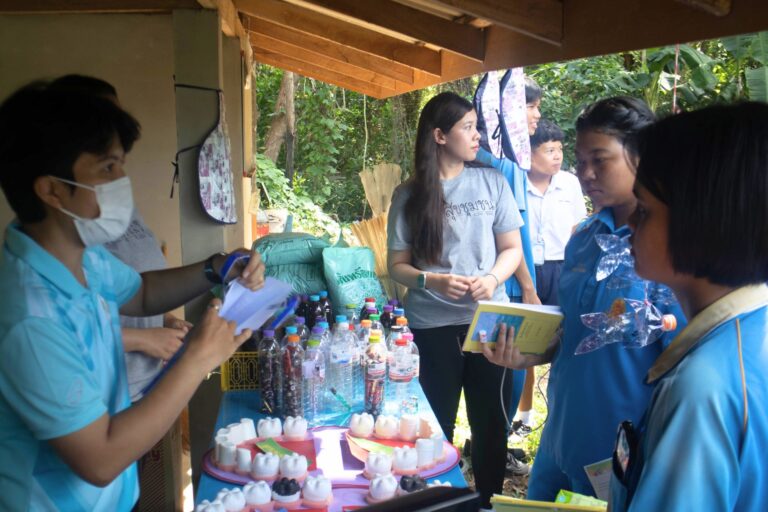 A group of people standing outside

AI-generated content may be incorrect.