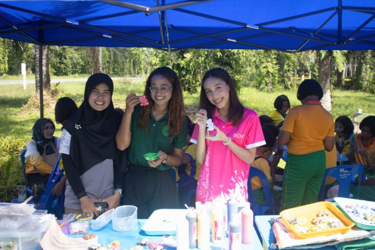 A group of young women holding flowers under a blue tent

AI-generated content may be incorrect.