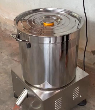 A large metal pot with a lid
AI-generated content may be incorrect.