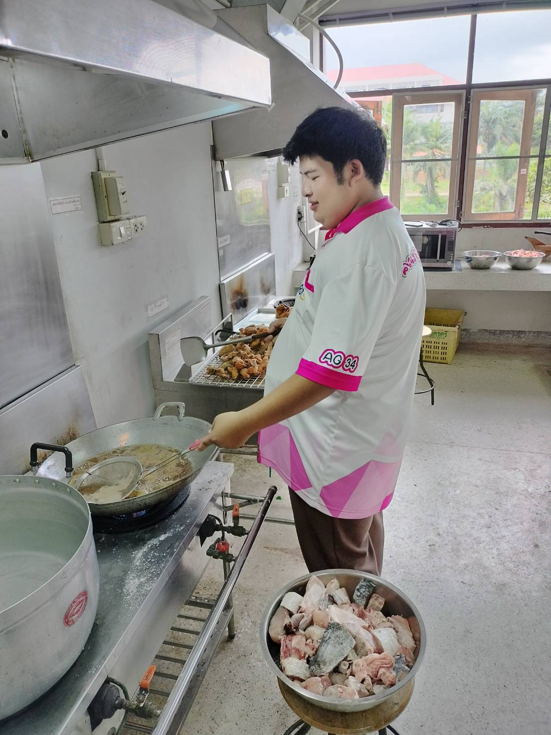 A person cooking in a kitchen
AI-generated content may be incorrect.