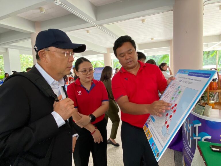 A person in a black suit and hat looking at a poster

AI-generated content may be incorrect.